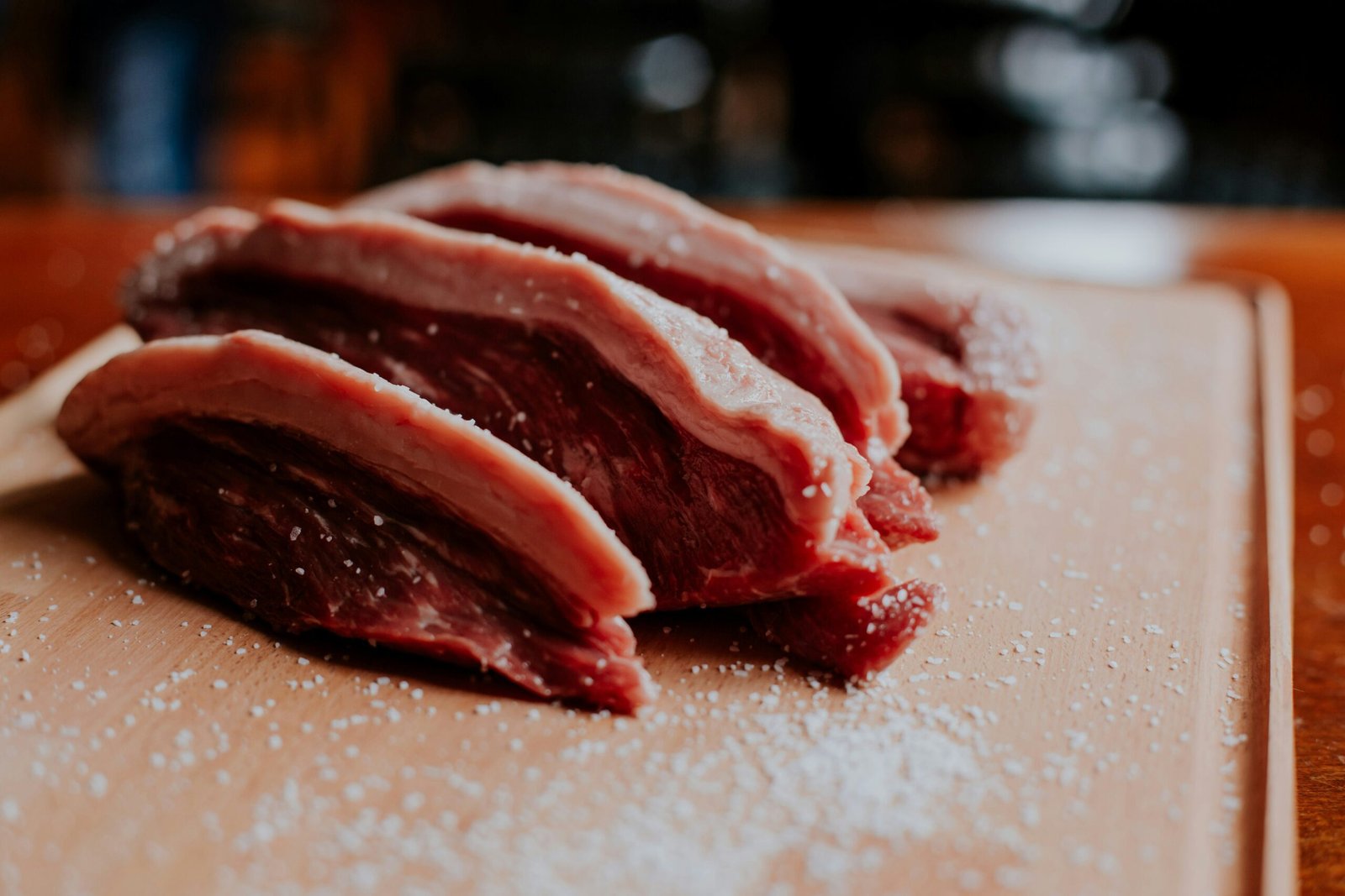 raw meat on white table